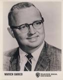 Smiling man with tie and glasses