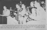 Jazz band performing with saxophones and trombones