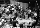 Band practicing in a recording session