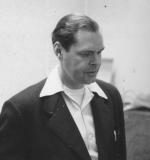 Man looking down in formal attire